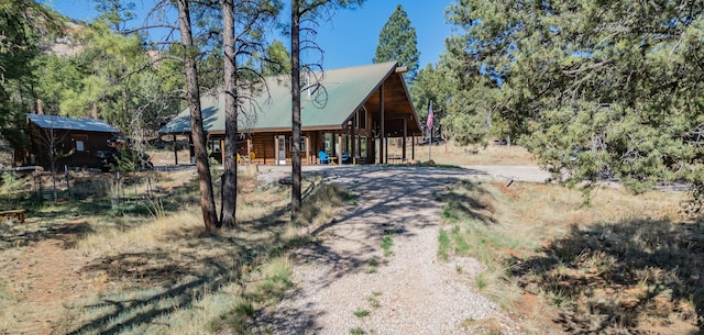31 Smokey Bear Rd, Ramah, NM 87321 - view of front facade featuring metal roof and dirt driveway