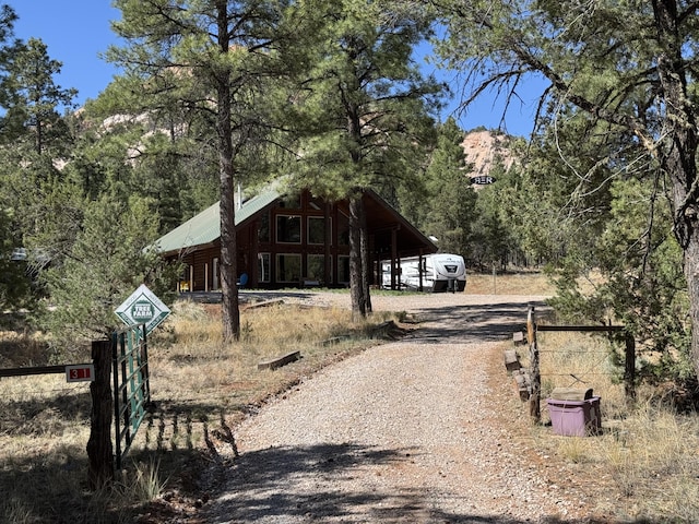 31 Smokey Bear Rd, Ramah, NM 87321 - view of front facade featuring dirt driveway and metal roof