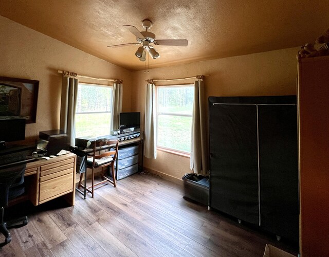 34 Halcon Rd, Ramah, NM 87321 - home office with a ceiling fan, light wood-type flooring, and vaulted ceiling