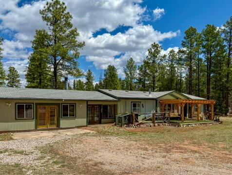 34 Halcon Rd, Ramah, NM 87321 - view of front facade featuring french doors