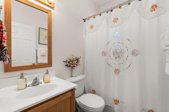1908 Selway Pl NW, Albuquerque, NM 87120 - bathroom featuring vanity, toilet, and a shower with curtain