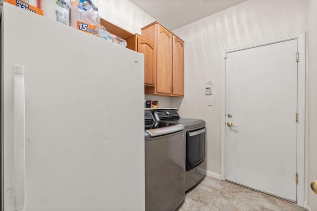 1908 Selway Pl NW, Albuquerque, NM 87120 - laundry area with washer and clothes dryer, cabinet space, and baseboards