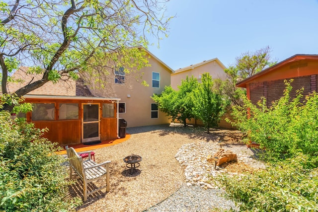 6105 Loro Ave NW, Albuquerque, NM 87114 - view of yard with an outdoor fire pit