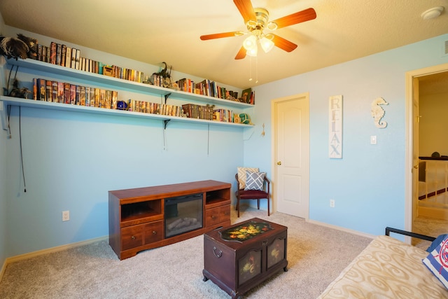 6105 Loro Ave NW, Albuquerque, NM 87114 - carpeted living area with ceiling fan and baseboards