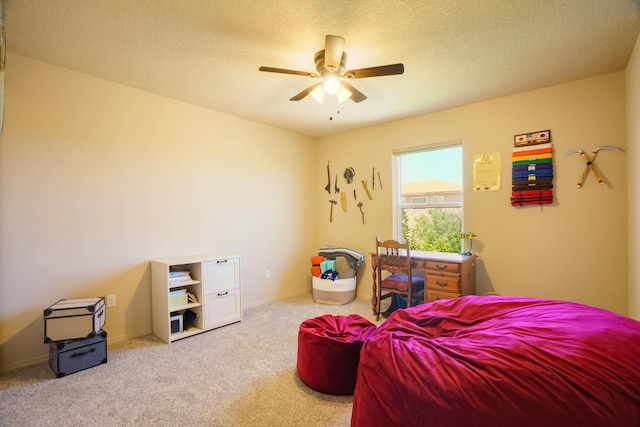 6105 Loro Ave NW, Albuquerque, NM 87114 - carpeted bedroom with baseboards, a textured ceiling, and ceiling fan