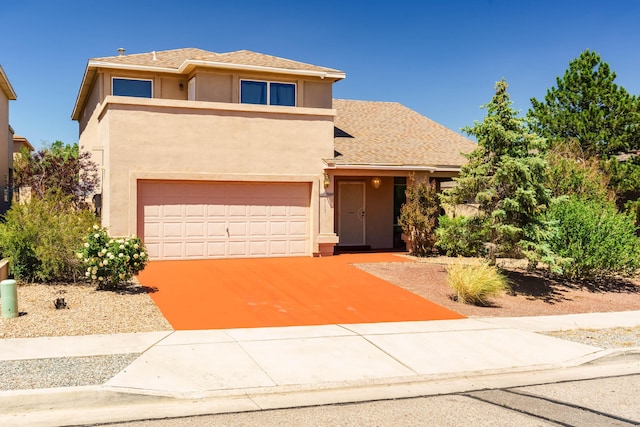6105 Loro Ave NW, Albuquerque, NM 87114 - view of front of house featuring stucco siding, concrete driveway, a garage, and a shingled roof