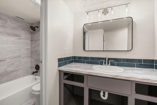 1616 Vail Pl SE, Albuquerque, NM 87106 - bathroom with vanity, washtub / shower combination, and toilet