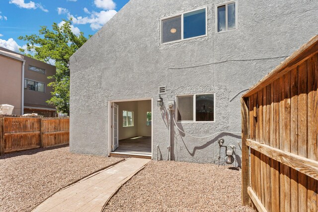 1616 Vail Pl SE, Albuquerque, NM 87106 - back of house with stucco siding