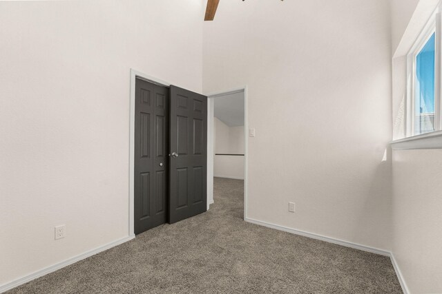 1616 Vail Pl SE, Albuquerque, NM 87106 - unfurnished bedroom with carpet floors, a closet, baseboards, and ceiling fan