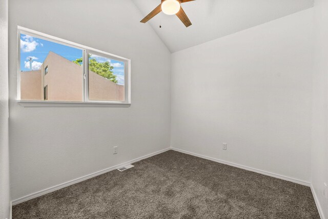 1616 Vail Pl SE, Albuquerque, NM 87106 - carpeted empty room with a ceiling fan, vaulted ceiling, and baseboards