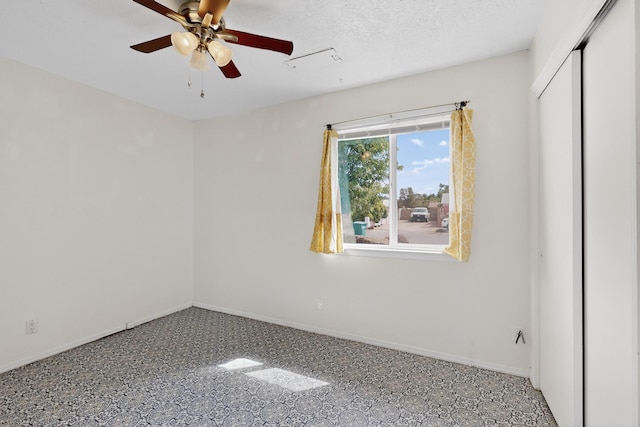 2110 Twisted Juniper Rd SE, Rio Rancho, NM 87124 - spare room with ceiling fan and baseboards