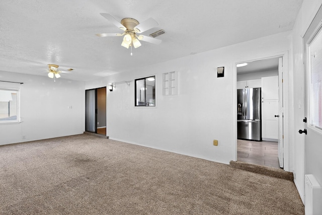 2110 Twisted Juniper Rd SE, Rio Rancho, NM 87124 - carpeted empty room featuring a ceiling fan