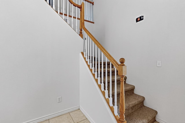717 Monterrey Rd NE, Rio Rancho, NM 87144 - stairs with tile patterned flooring and baseboards