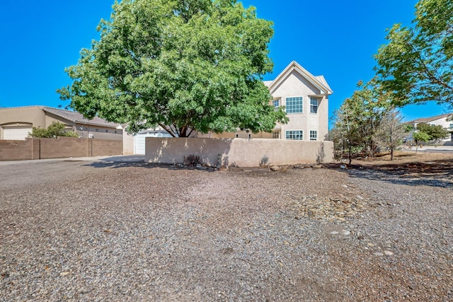 717 Monterrey Rd NE, Rio Rancho, NM 87144 - view of front of property with stucco siding