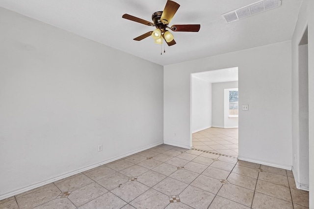 717 Monterrey Rd NE, Rio Rancho, NM 87144 - spare room with ceiling fan and light tile patterned flooring