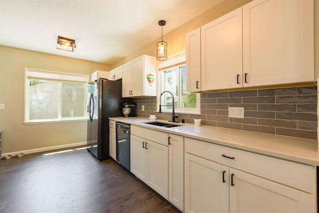 1805 California St NE, Albuquerque, NM 87110 - kitchen featuring a sink, stainless steel dishwasher, backsplash, and white cabinetry