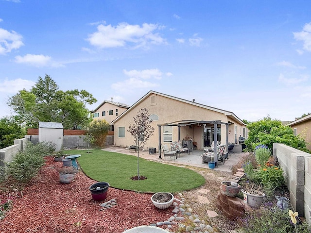 4532 Ambrose Alday Loop SE, Rio Rancho, NM 87124 - back of house featuring stucco siding and a patio