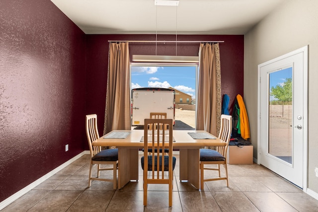 2625 Globe Ct NE, Rio Rancho, NM 87124 - dining space with tile patterned floors and baseboards