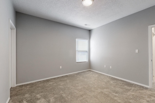 7037 Cleary Loop NE, Rio Rancho, NM 87144 - spare room with carpet floors, a textured ceiling, and baseboards