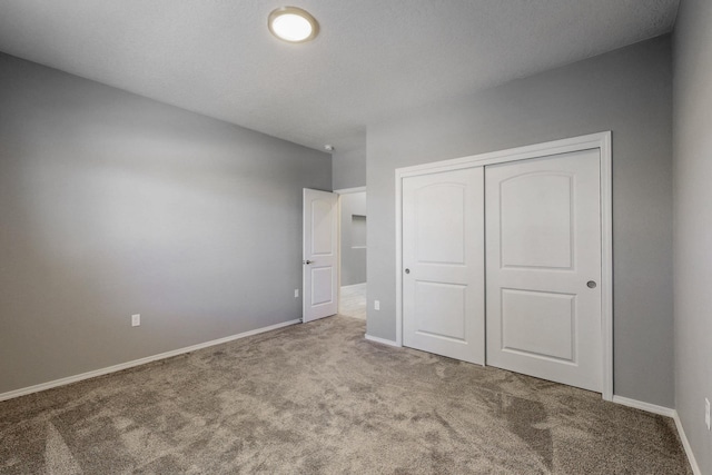 7037 Cleary Loop NE, Rio Rancho, NM 87144 - unfurnished bedroom with carpet floors, a closet, and baseboards