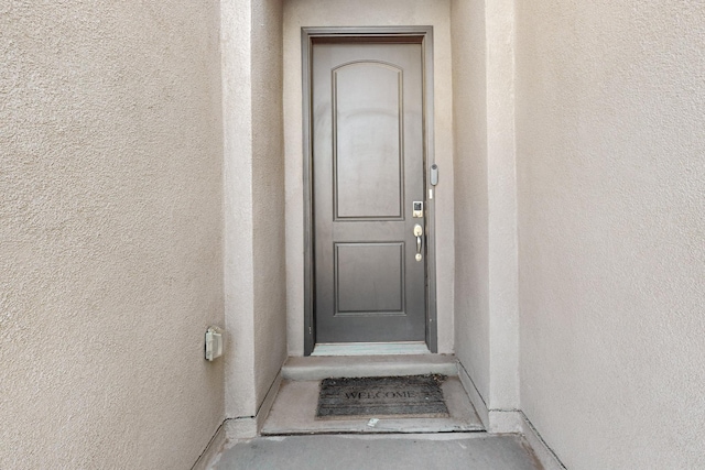 7037 Cleary Loop NE, Rio Rancho, NM 87144 - entrance to property with stucco siding