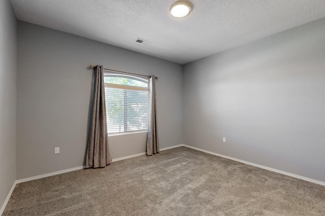 7037 Cleary Loop NE, Rio Rancho, NM 87144 - empty room featuring light colored carpet, a textured ceiling, and baseboards