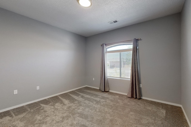 7037 Cleary Loop NE, Rio Rancho, NM 87144 - spare room featuring light carpet and a textured ceiling