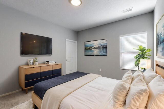 7037 Cleary Loop NE, Rio Rancho, NM 87144 - bedroom featuring light carpet and baseboards