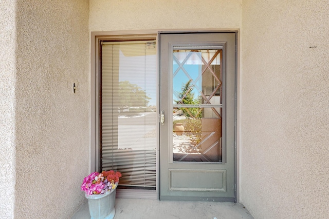 12304 Phoenix Ave NE, Albuquerque, NM 87112 - view of exterior entry with stucco siding