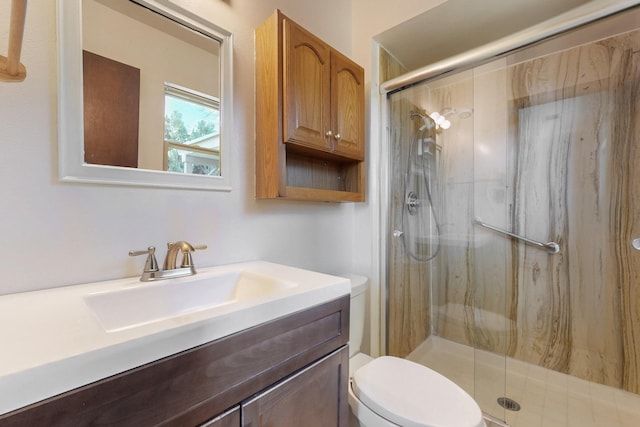 12304 Phoenix Ave NE, Albuquerque, NM 87112 - bathroom featuring toilet, vanity, and a shower stall