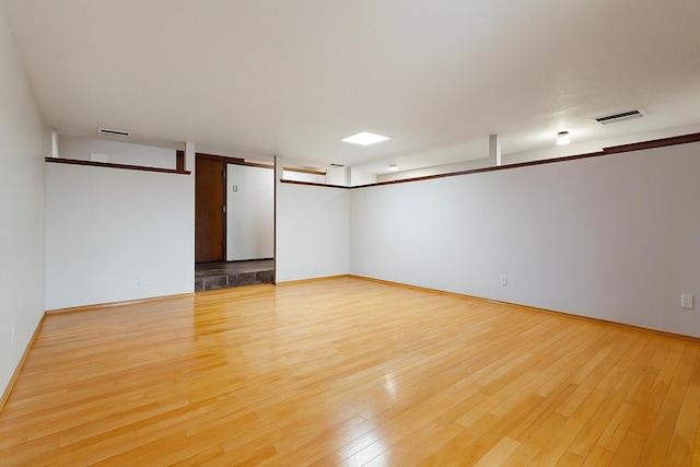 12304 Phoenix Ave NE, Albuquerque, NM 87112 - spare room featuring light wood-type flooring and baseboards