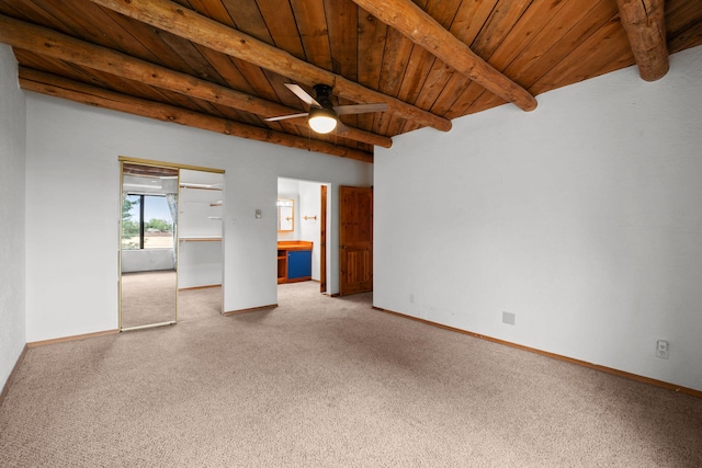 234 Horton Ln NW, Albuquerque, NM 87114 - unfurnished room featuring wooden ceiling with exposed beams, carpet floors, ceiling fan, and baseboards