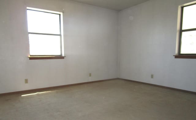 212 E Tingley Ave, Moriarty, NM 87035 - empty room featuring baseboards