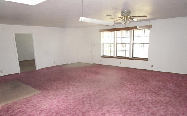 212 E Tingley Ave, Moriarty, NM 87035 - spare room featuring a ceiling fan and carpet