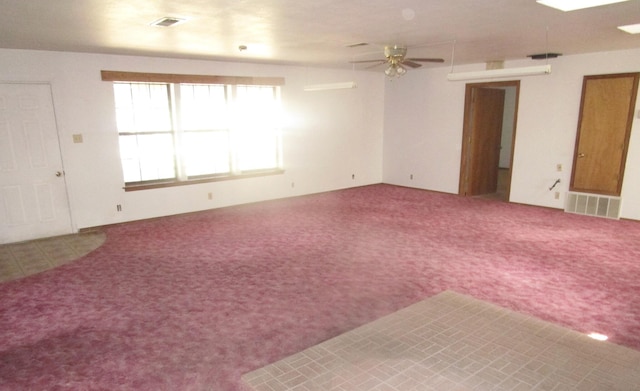 212 E Tingley Ave, Moriarty, NM 87035 - carpeted empty room featuring ceiling fan