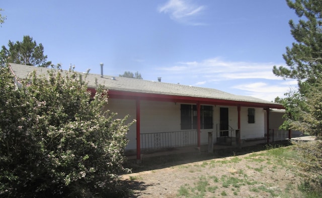 212 E Tingley Ave, Moriarty, NM 87035 - back of house with covered porch