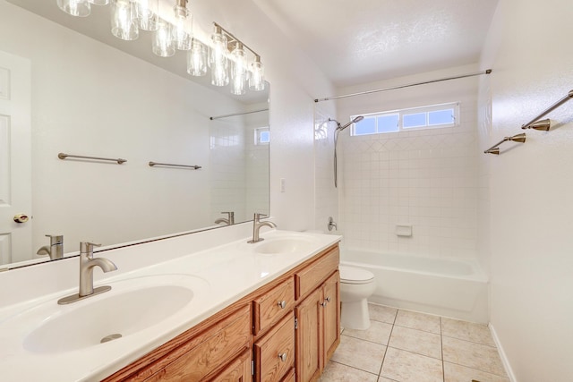 6923 Luz Del Sol Pl NW, Albuquerque, NM 87114 - bathroom with tile patterned floors, double vanity, toilet, shower / tub combination, and baseboards
