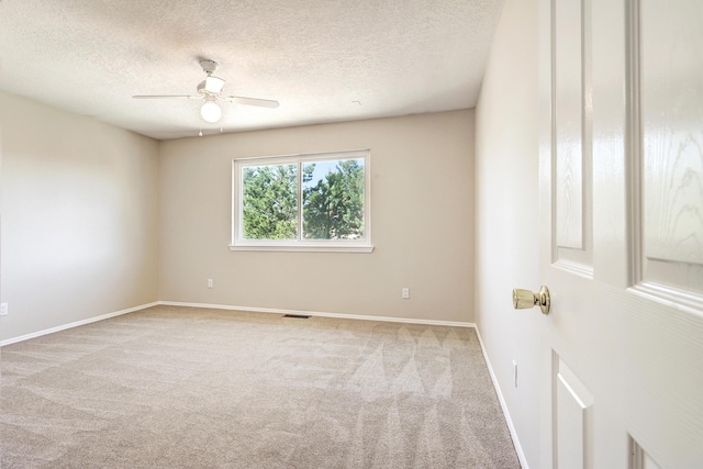 6923 Luz Del Sol Pl NW, Albuquerque, NM 87114 - unfurnished room featuring carpet, a ceiling fan, a textured ceiling, and baseboards