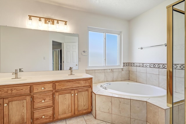 6923 Luz Del Sol Pl NW, Albuquerque, NM 87114 - full bath featuring a garden tub, double vanity, and tile patterned floors