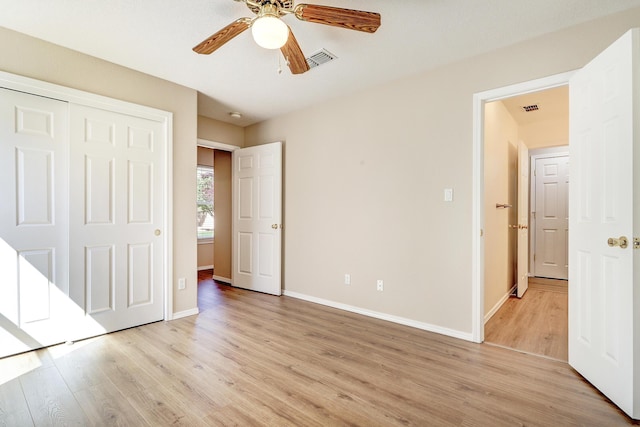 6923 Luz Del Sol Pl NW, Albuquerque, NM 87114 - unfurnished bedroom featuring light wood-type flooring, baseboards, a closet, and a ceiling fan