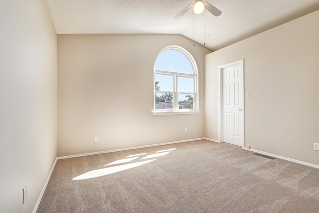 6923 Luz Del Sol Pl NW, Albuquerque, NM 87114 - empty room with carpet floors, lofted ceiling, ceiling fan, and baseboards