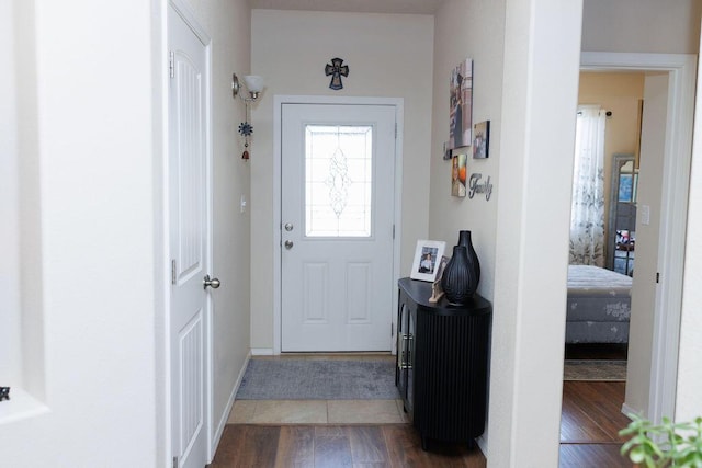 1019 Jacobs Dr NE, Rio Rancho, NM 87144 - entrance foyer featuring wood finished floors and baseboards