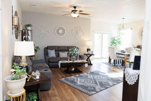 1019 Jacobs Dr NE, Rio Rancho, NM 87144 - living area featuring ceiling fan and wood finished floors