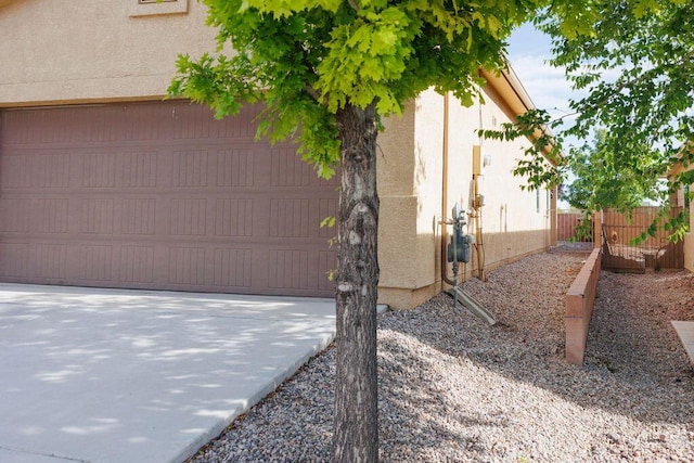 1019 Jacobs Dr NE, Rio Rancho, NM 87144 - view of home's exterior with stucco siding