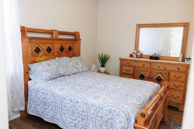 1019 Jacobs Dr NE, Rio Rancho, NM 87144 - bedroom with dark wood finished floors