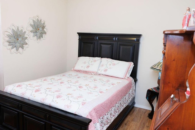 1019 Jacobs Dr NE, Rio Rancho, NM 87144 - bedroom featuring wood finished floors and baseboards