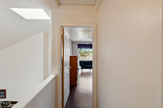 117 El Mundo Rd, Rio Communities, NM 87002 - corridor featuring an upstairs landing and dark wood finished floors