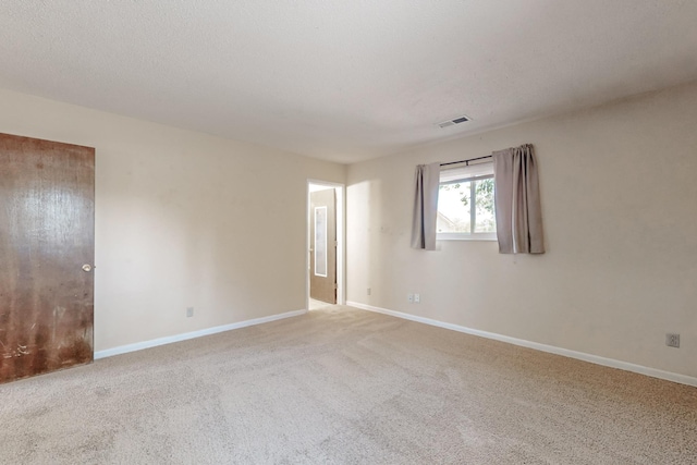 508 San Juan De Rio Dr SE, Rio Rancho, NM 87124 - spare room featuring carpet floors and baseboards