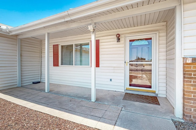 508 San Juan De Rio Dr SE, Rio Rancho, NM 87124 - doorway to property with a porch