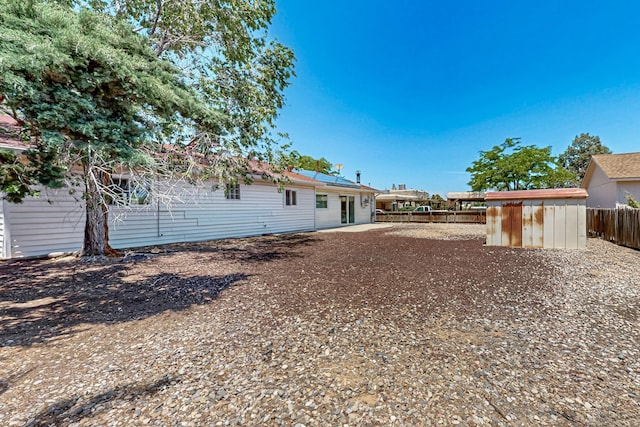 508 San Juan De Rio Dr SE, Rio Rancho, NM 87124 - fenced backyard featuring a patio area